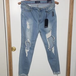 Distressed denim jeans